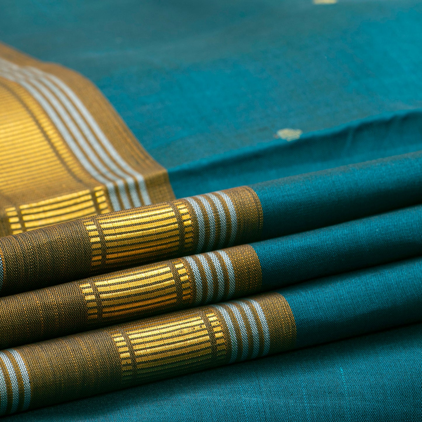 Teal Kanchipuram Silk Saree With A Green Border For Festive Wear PV ABI 50986