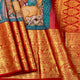 Krishna Leela Themed Blue And Red Handpainted Kalamkari Kanchipuram Silk Saree For Festive Wear PV KAI KK 102