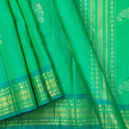 Green And Turquoise Kanchipuram Silk Saree With Meenakari Zari Buttas For Festive Wear PV NYC 1780