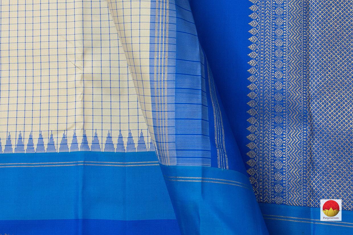 Off White Kanchipuram Silk Saree With a Contrast Blue Border Handwoven Pure Silk Pure Zari For Festive Wear PV NYC 928 - Silk Sari - Panjavarnam